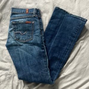 7 for all Mankind designer jeans. Medium wash with slight flare leg.
